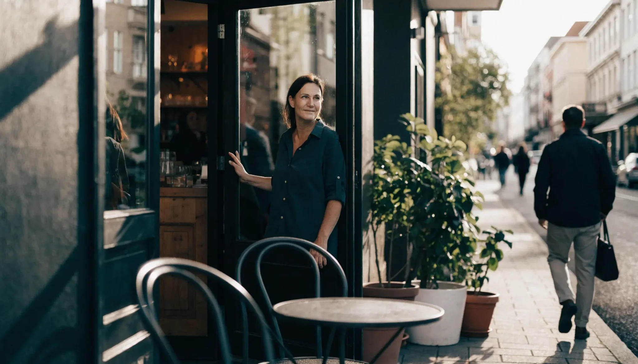 local-seo-perth-cafe-storefront - Caffeinate Digital Perth cafe owner standing in the doorway of her local business storefront
