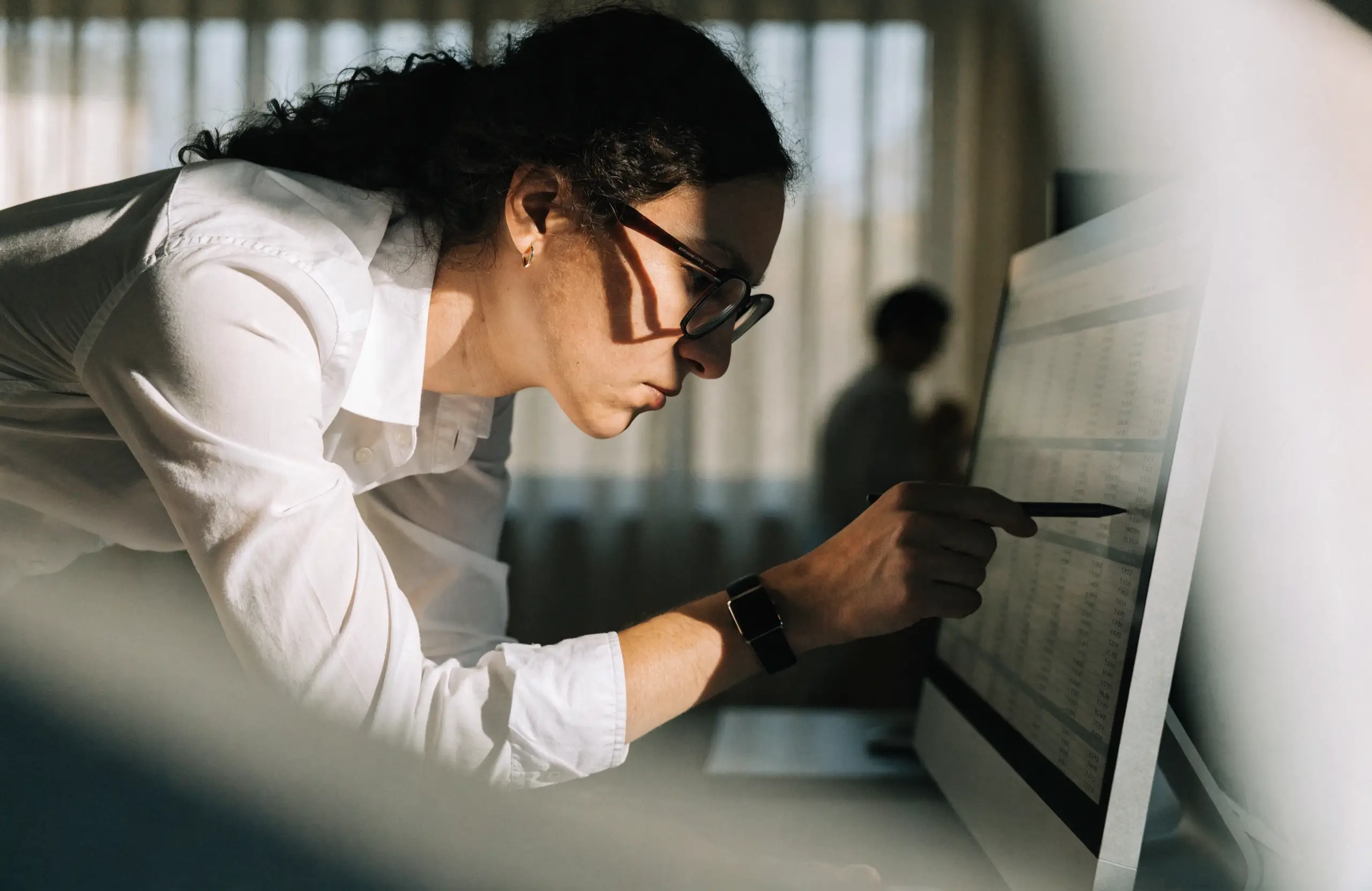 performance-max-audit-spend - Caffeinate Digital Analyst auditing advertising spend figures on screen