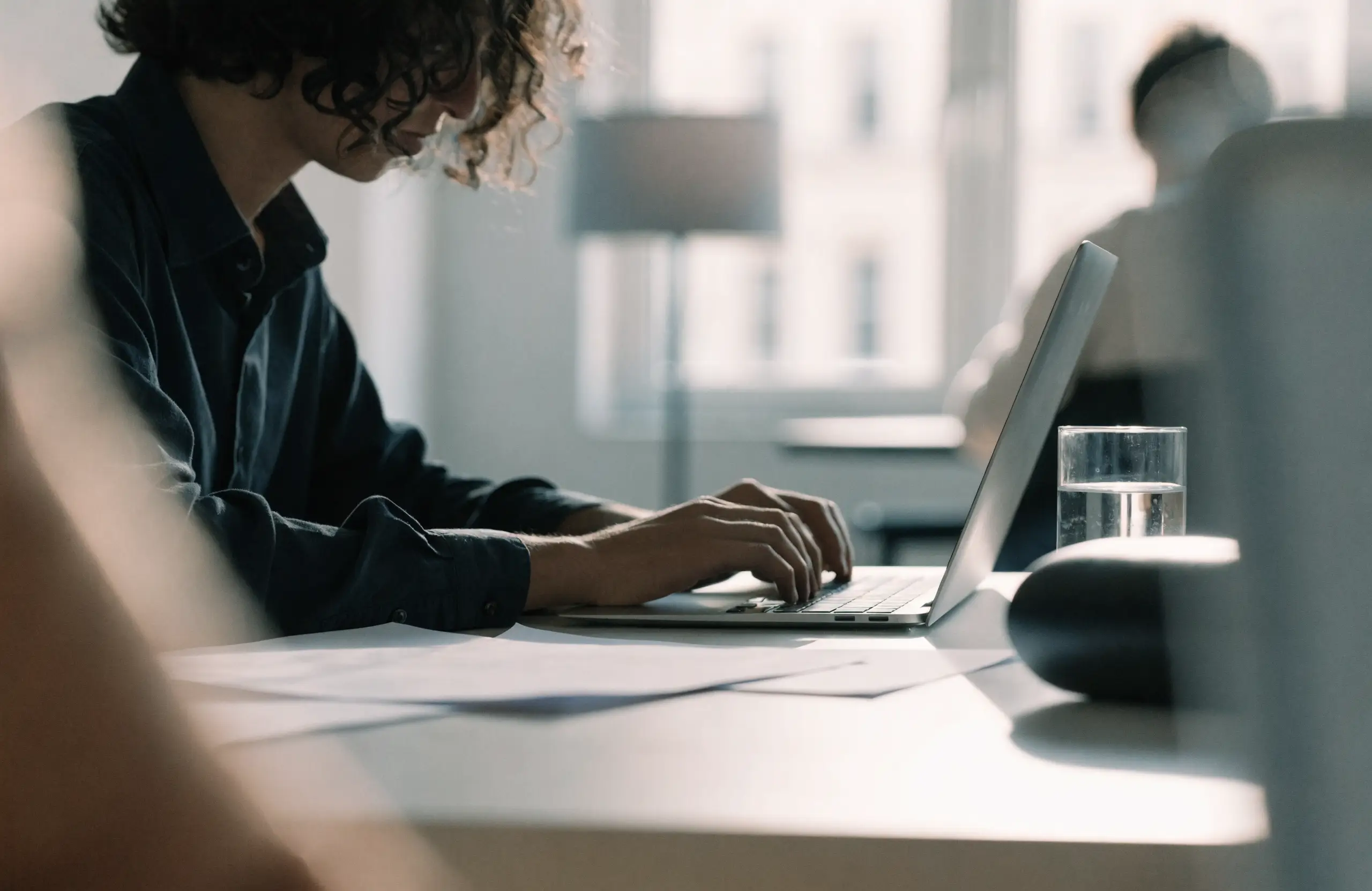 Content writer working on an article that builds organic traffic